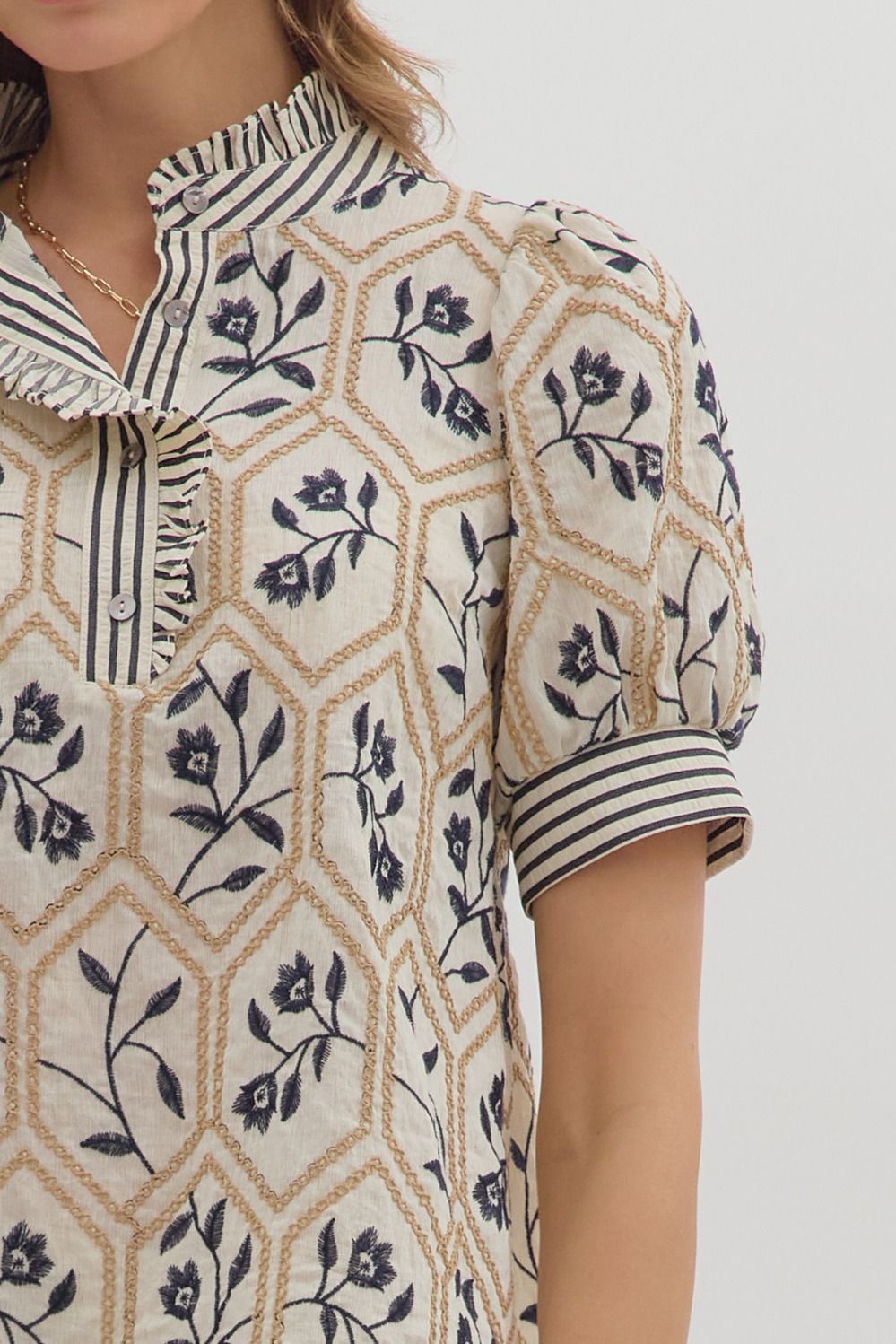 Cream Top with Navy Embroidered Floral Pattern